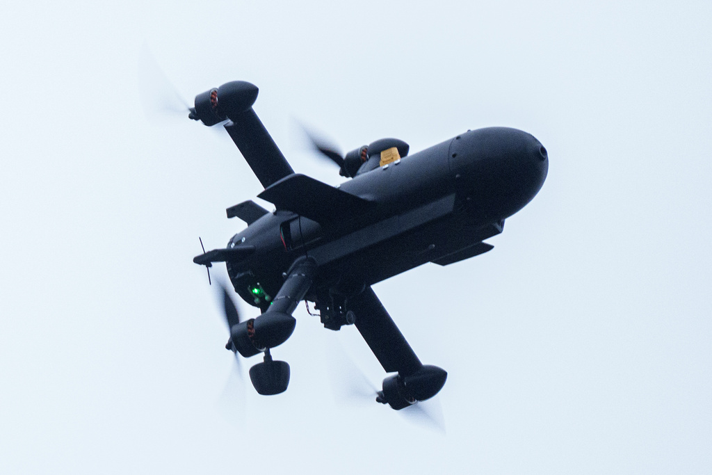 An interceptor drone of "General Cherry" company flys at the polygon in Ukraine, on Dec. 4, 2025. (AP Photo/Evgeniy Maloletka)