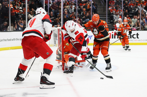 Carolina Hurricanes left wing William Carrier (28) attempts to score against Anaheim Ducks goaltender Lukas Dostal (1) during the second period of an NHL hockey game Thursday, Oct. 16, 2025, in Anaheim, Calif. (AP Photo/Ethan Swope) Carolina Hurricanes left wing William Carrier (28) attempts to score against Anaheim Ducks goaltender Lukas Dostal (1) during the second period of an NHL hockey game Thursday, Oct. 16, 2025, in Anaheim, Calif. (AP Photo/Ethan Swope)
