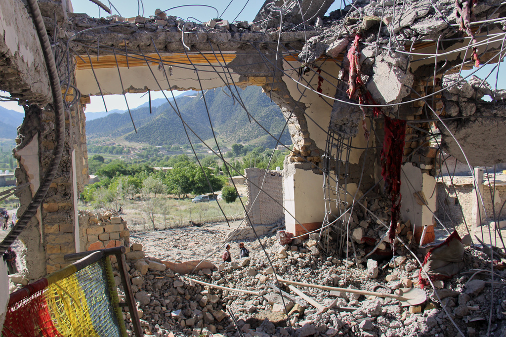The remains of a destroyed house are seen after what Taliban officials said were Pakistani airstrikes a day earlier that killed civilians, including children, in the village of Mandokhail, Chamkani district, Paktia province, Afghanistan, Monday, June 29, 2026. (AP Photo/Saifullah Zahir)