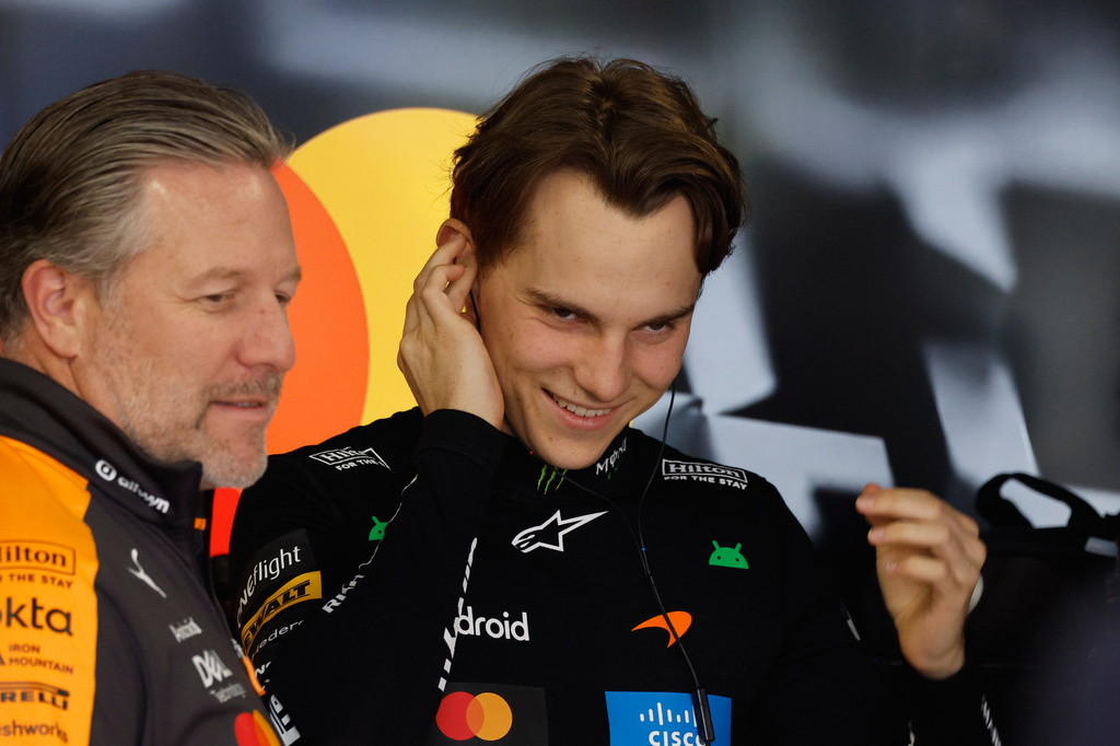 McLaren driver Oscar Piastri of Australia smiles ahead of for the qualifying session of the Japanese Formula One Grand Prix at the Suzuka Circuit in Suzuka, Japan, Saturday, March 28, 2026. (Franck Robichon/Pool Photo via AP)