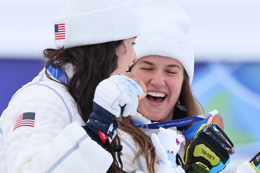 United States' Jacqueline Wiles, left, and Paula Moltzen pose with their bronze medals of a women's team combined race, at the 2026 Winter Olympics, in Cortina d'Ampezzo, Italy, Tuesday, Feb. 10, 2026. (AP Photo/Marco Trovati)