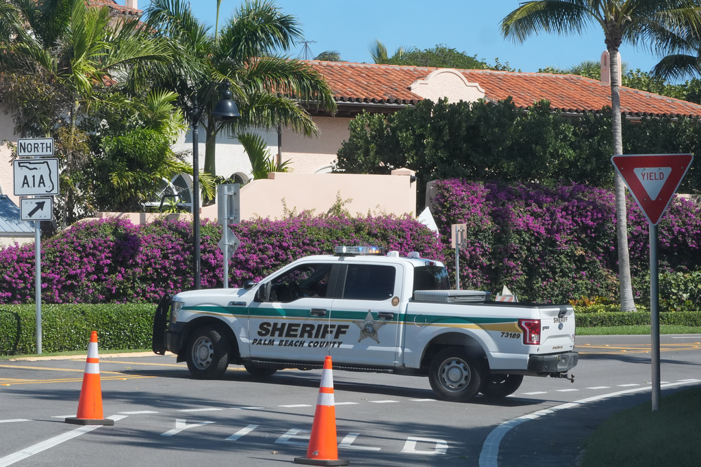 A Palm Beach County Sheriff vehicle blocks traffic near Mar-a-Lago, Sunday, Feb. 22, 2026, in Palm Beach, Fla. (AP Photo/Marta Lavandier)