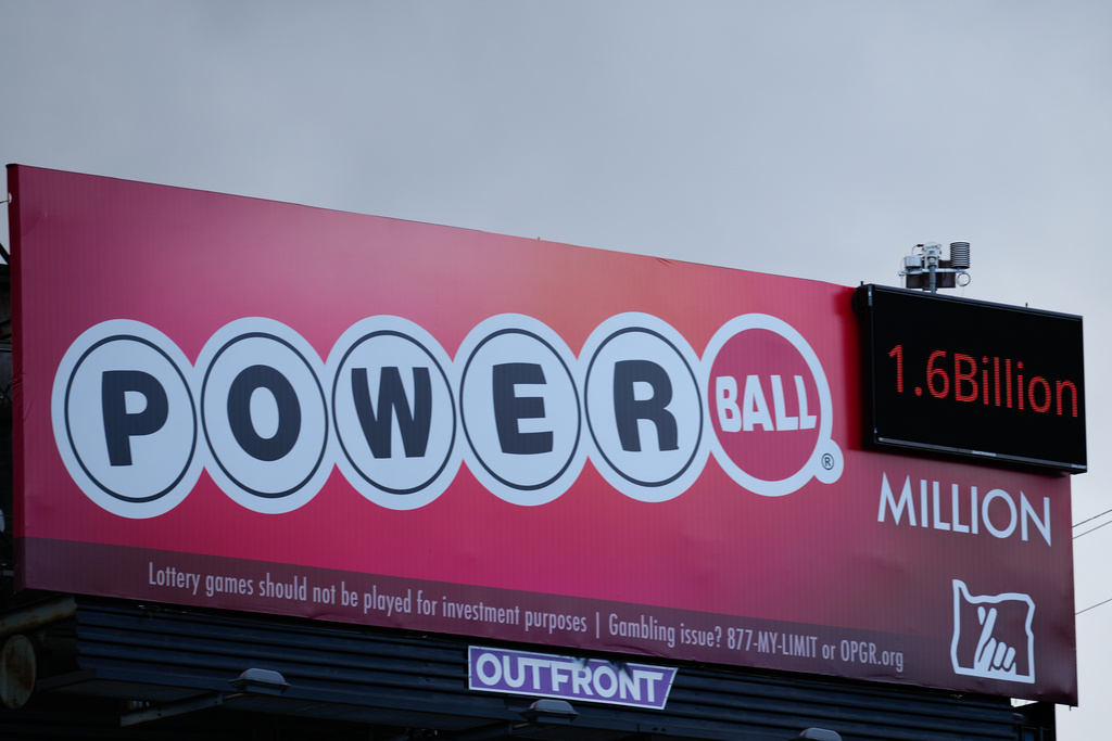 A billboard advertising the Powerball lottery is displayed, Monday, Dec. 22, 2025, in Portland, Ore. (AP Photo/Jenny Kane)