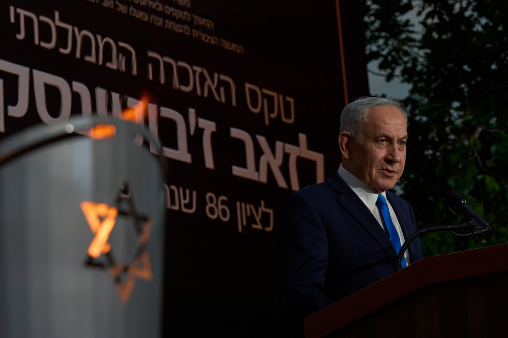 Israeli Prime Minister Benjamin Netanyahu speaks at the state memorial for Ze'ev Jabotinsky, at Mount Herzl Military Cemetery in Jerusalem, Tuesday, July 14, 2026. (AP Photo/Ohad Zwigenberg)