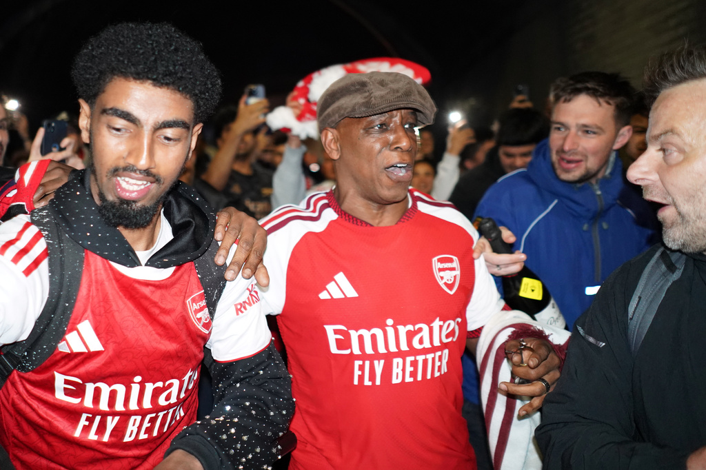 Former Arsenal player Ian Wright arrives at the Arsenal stadium to celebrate with supporters after Arsenal's soccer team won the Premier League title in London, Tuesday, May 19, 2026.(AP Photo/Alberto Pezzali)