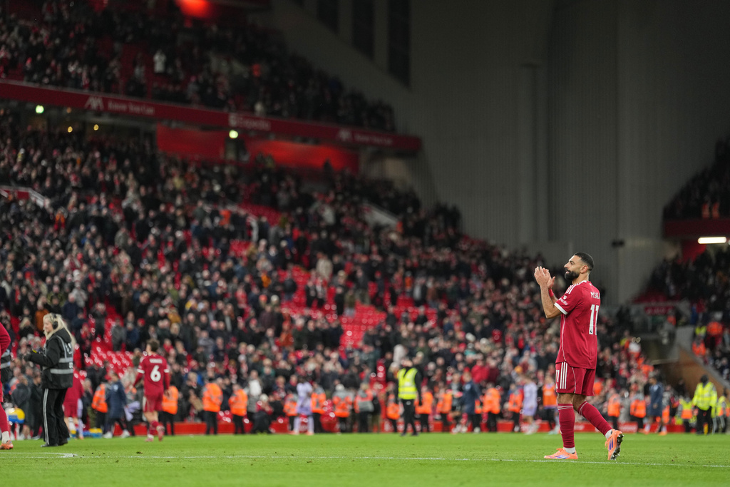 Liverpool's Mohamed Salah applauds supporters after the English Premier League soccer match between Liverpool and Brighton and Hove Albion in Liverpool, England, Saturday, Dec. 13, 2025. (AP Photo/Jon Super)