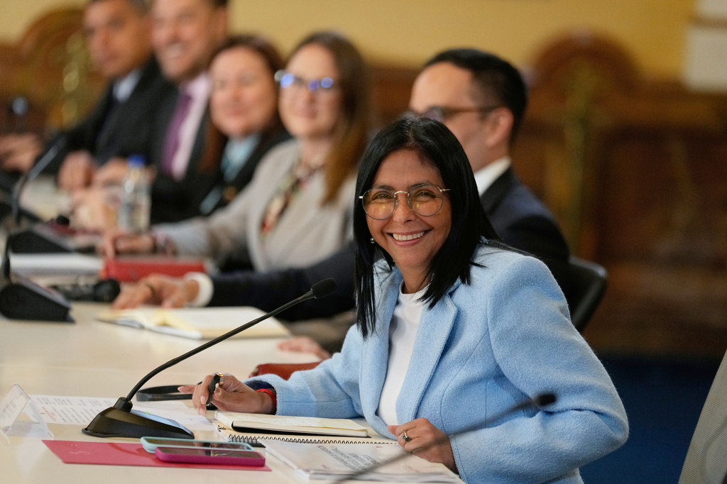 FILE - Venezuela's acting President Delcy Rodriguez smiles during a meeting with a delegation led by U.S. Energy Secretary Chris Wright at Miraflores Palace in Caracas, Venezuela, Wednesday, Feb. 11, 2026. (AP Photo/Ariana Cubillos, File)