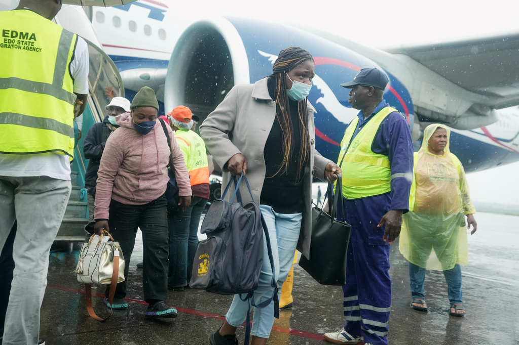 Nigerian nationals repatriated from South Africa, following concerns about unrest, arrive at the Murtala Muhammed International Airport in Lagos, Nigeria, Tuesday, June 30, 2026. (AP Photo/Sunday Alamba)