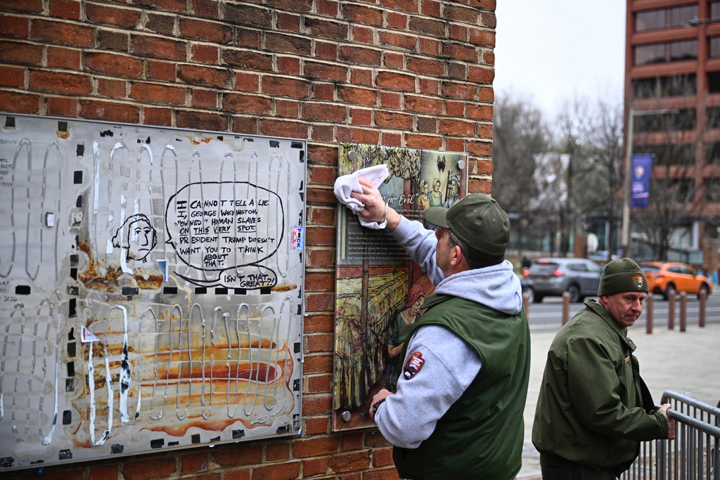 Panels that were part of an exhibit on slavery at the President's House Site in Philadelphia are put back Thursday, Feb. 19, 2026. (AP Photo/Joe Lamberti)