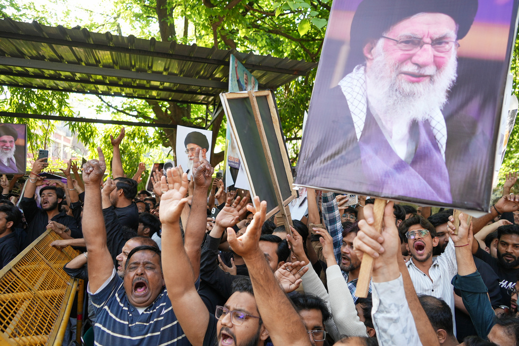 Shiite Muslims protest against the U.S.-Israeli attack on Iran and killing of the Supreme Leader Ayatollah Ali Khamenei in New Delhi, India, Sunday, March 1, 2026. (AP Photo/Piyush Nagpal)