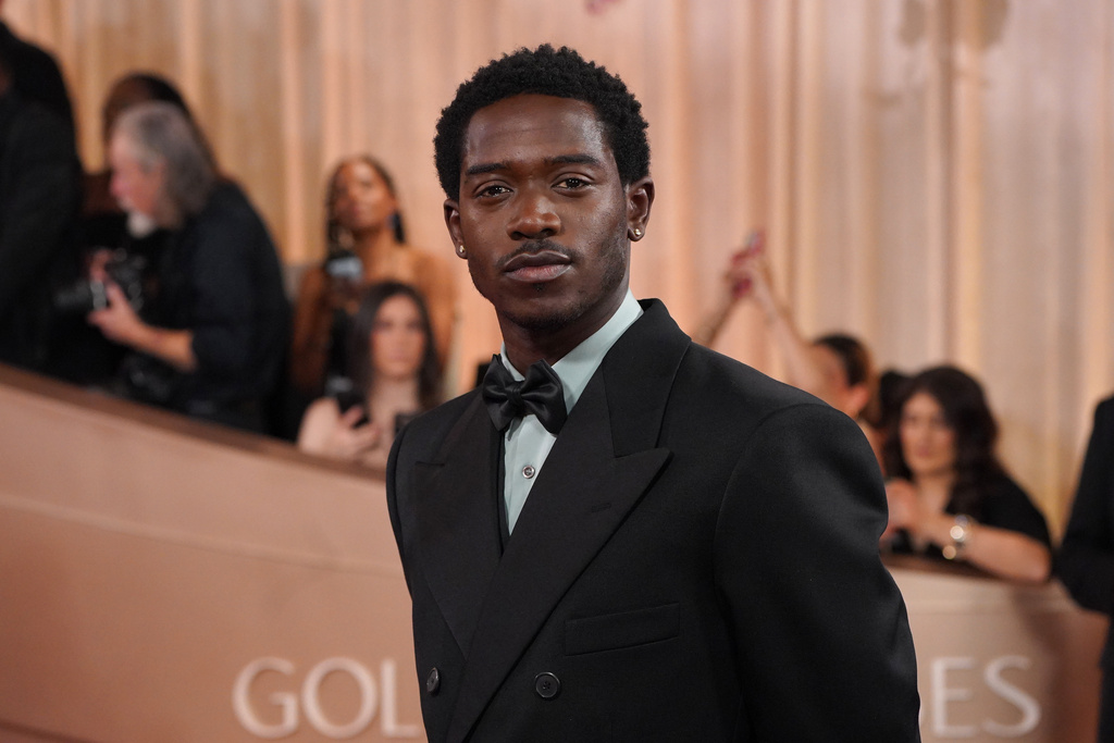 Miles Caton arrives at the 83rd Golden Globes on Sunday, Jan. 11, 2026, at the Beverly Hilton in Beverly Hills, Calif. (Photo by Jordan Strauss/Invision/AP)