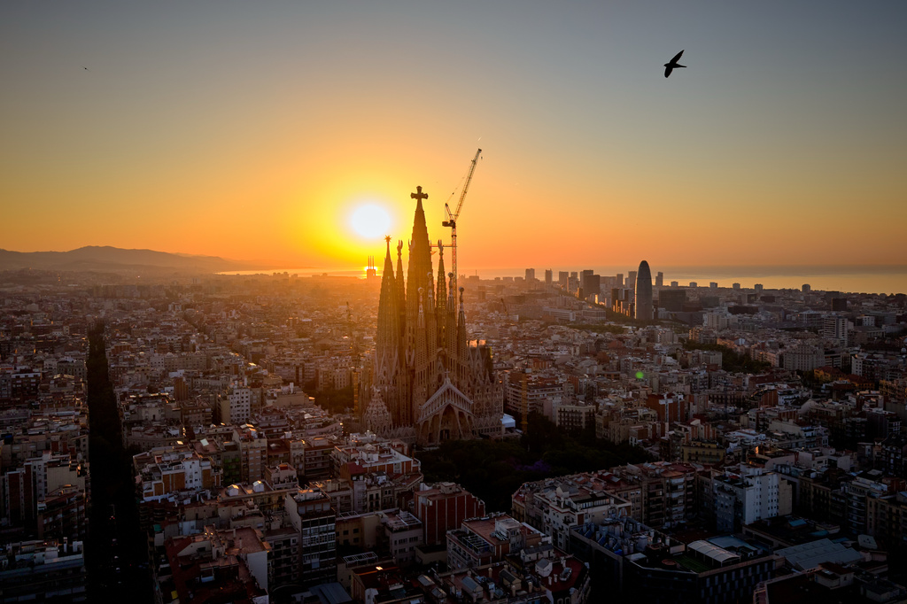 The sun rises behind Antoni Gaudí's iconic Basilica of the Sagrada Familia in Barcelona, Spain, Thursday, May 28, 2026, ahead of Pope Leo XIV's visit to the city in June. (AP Photo/Emilio Morenatti)