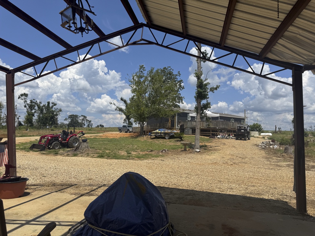 Dana Grimes and her husband bought a new home after theirs was destroyed by a tornado. But, five months after the storm, much of the wreckage still covers their property. Photograph taken in Jayess, Mississippi on Thursday, Aug. 14, 2025. (AP Photo/Sophie Bates)