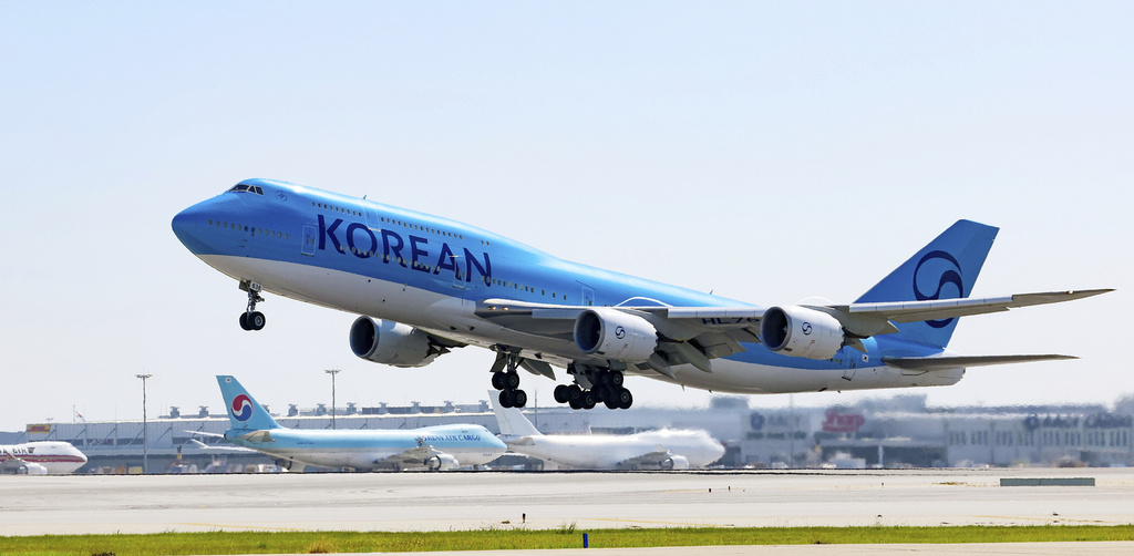 A Korean Air chartered plane takes off to bring back Korean workers detained in an immigration raid in Georgia, at Incheon International Airport, South Korea, Wednesday, Sept. 10, 2025. (Yonhap via AP)