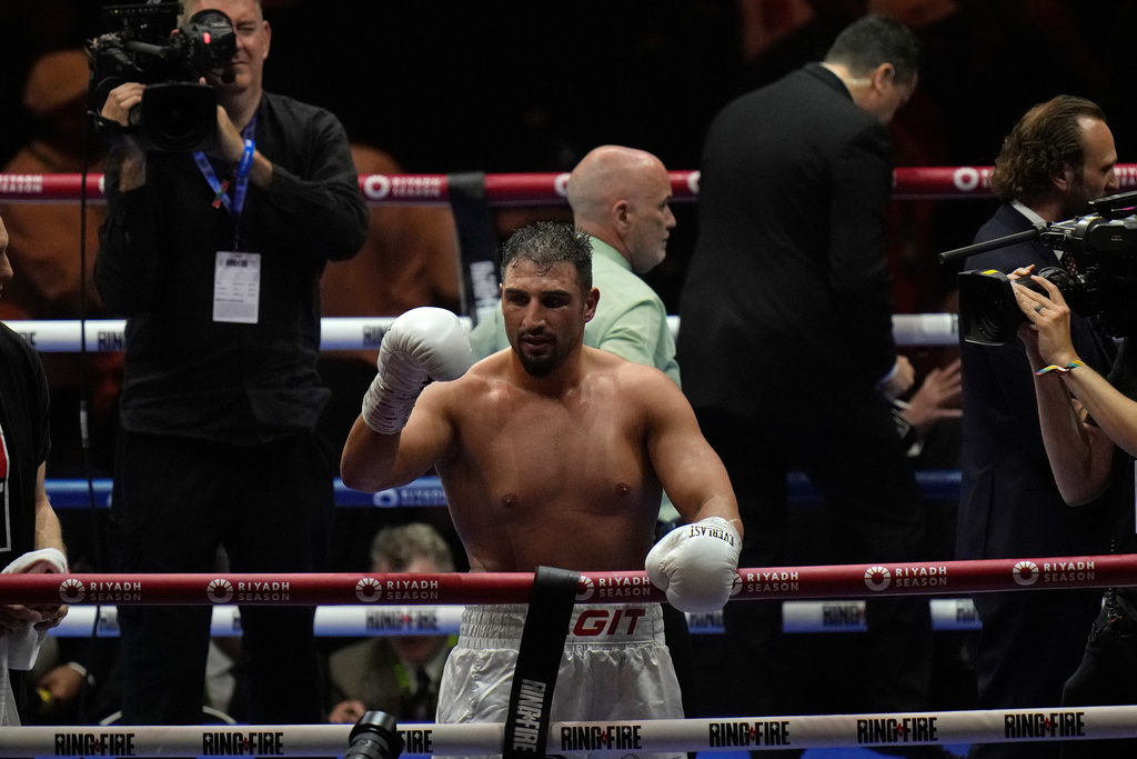 FILE - Germany's Agit Kabayel reacts after beating Cuba's Frank Sanchez during their Heavyweight boxing fight, at the Kingdom Arena in Riyadh, Saudi Arabia, Saturday, May 18, 2024. (AP Photo/Francisco Seco, File)