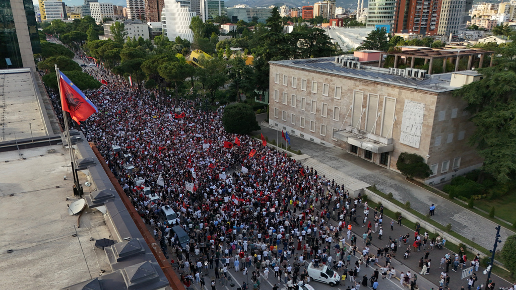 Protesters take part in a rally in Tirana, Saturday, June 6, 2026, against the construction of a massive coastal development project linked to Jared Kushner and Ivanka Trump at Narta lagoon area, western Albania. (AP Photo/Hameraldi Agolli)