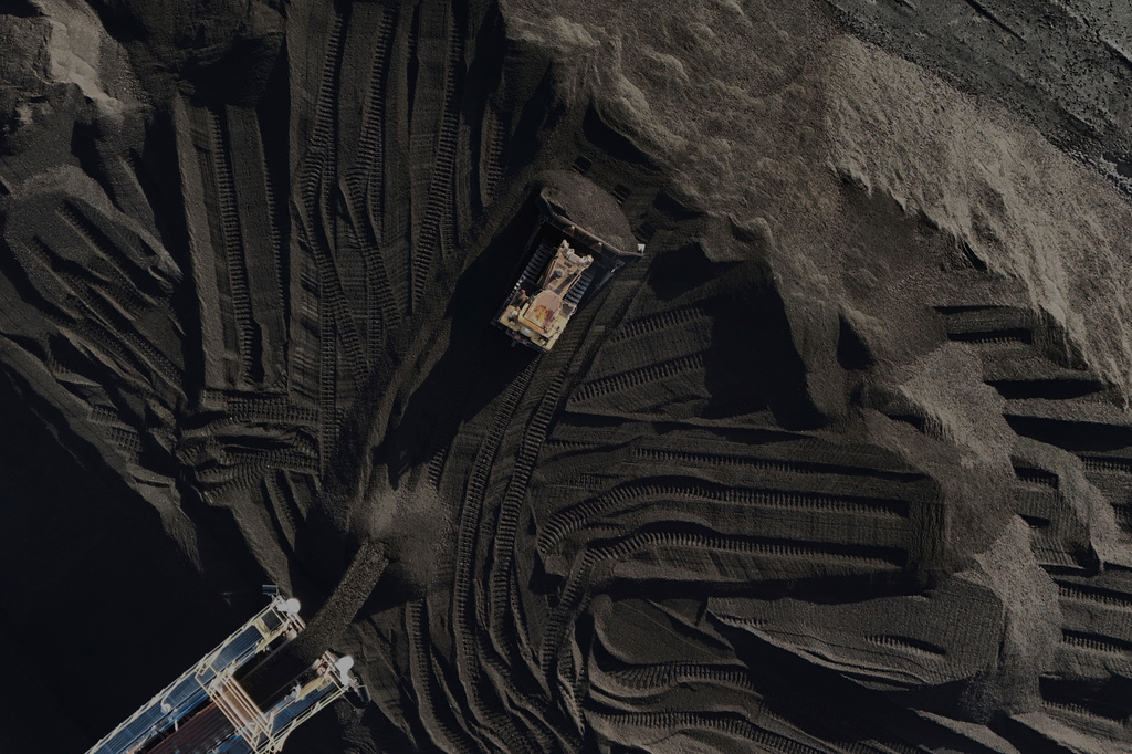 FILE - A bulldozer moves coal, April 10, 2025, in Princeton, Ind. (AP Photo/Joshua A. Bickel, File)