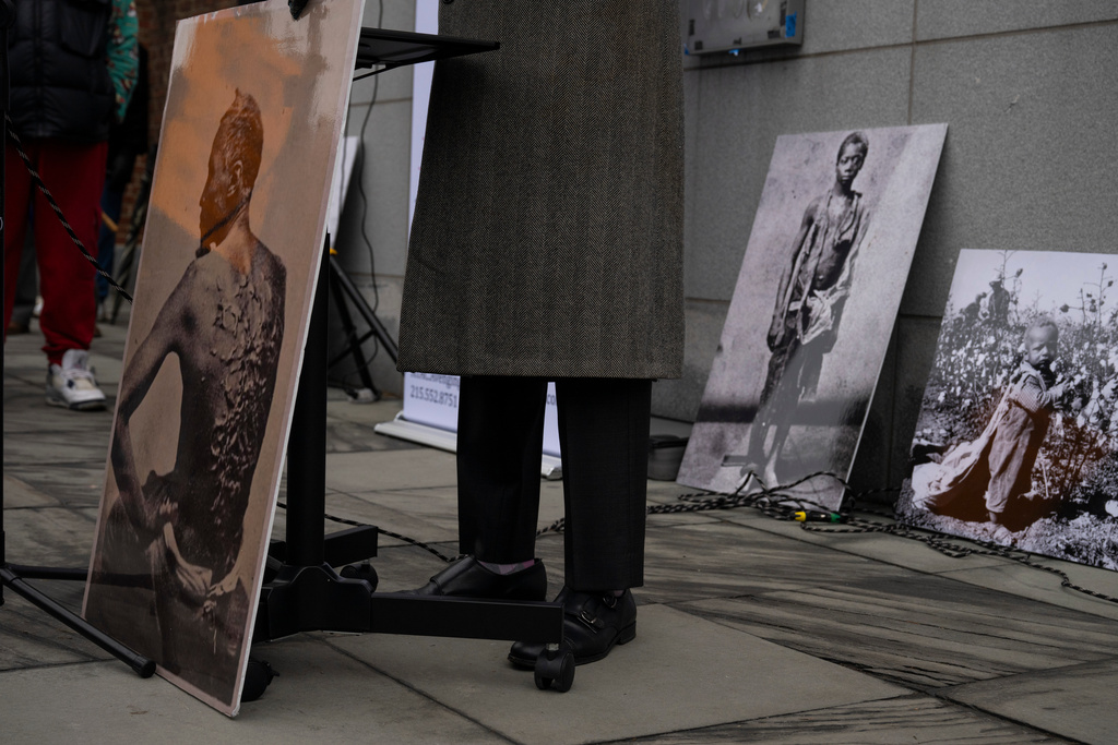 Attorney and founder of Avenging the Ancestors Coalition Michael Coard speaks during a rally celebrating the reinstallation of a slavery exhibit at the President's House Site in Philadelphia on Thursday, Feb. 19, 2026, in Philadelphia. (AP Photo/Joe Lamberti)