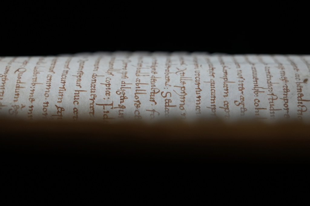 The 8th-century manuscript copy of the Venerable Bede's Ecclesiastical History of the English People, containing a rare, long-lost copy of Caedmon's Hymn — the first poem ever written down in Old English — is seen at Rome's National Library, Thursday, May 8, 2026. (AP Photo/Andrea Rosa)