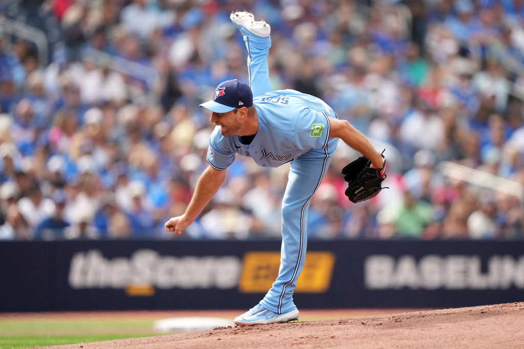 Toronto Blue Jays pitcher Max Scherzer (31) throws during the first inning of a baseball game against the Detroit Tigers in Toronto, Wednesday, Sept. 16, 2026. (Nathan Denette/The Canadian Press via AP)