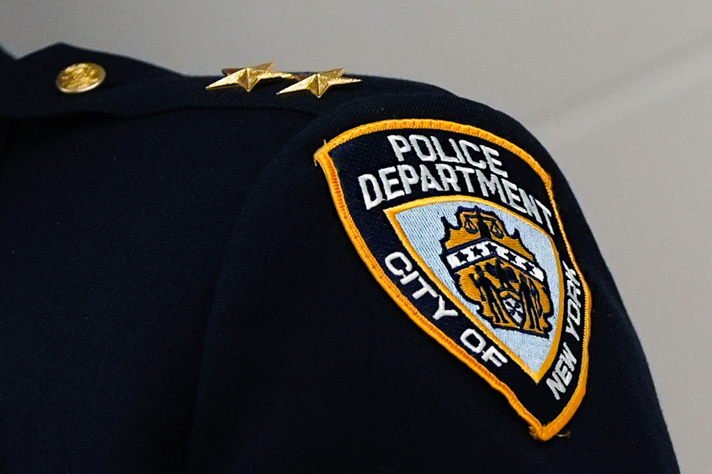 FILE - A patch adorns the uniform of a high ranking NYPD official during an event at the 40th precinct, Thursday, Feb. 20, 2025, in the Bronx borough of New York. (AP Photo/Julia Demaree Nikhinson, File)