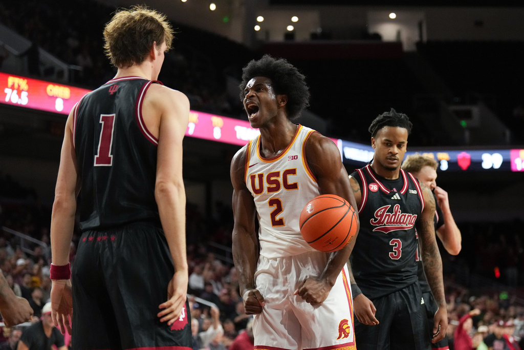 Southern California forward Ezra Ausar (2) reacts after scoring a basket and drawing a foul during the second half of an NCAA college basketball game against Indiana in Los Angeles, Tuesday, Feb. 3, 2026. (AP Photo/Jae C. Hong)