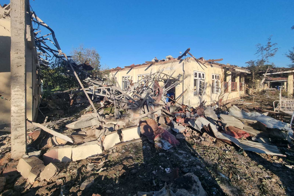 In this photo provided by Wai Hun Aung, a damaged building is seen at the hospital that was allegedly hit by a military air strike in Mrauk-U township in Rakhine state, Myanmar, Thursday, Dec.11, 2025. (Wai Hun Aung via AP)