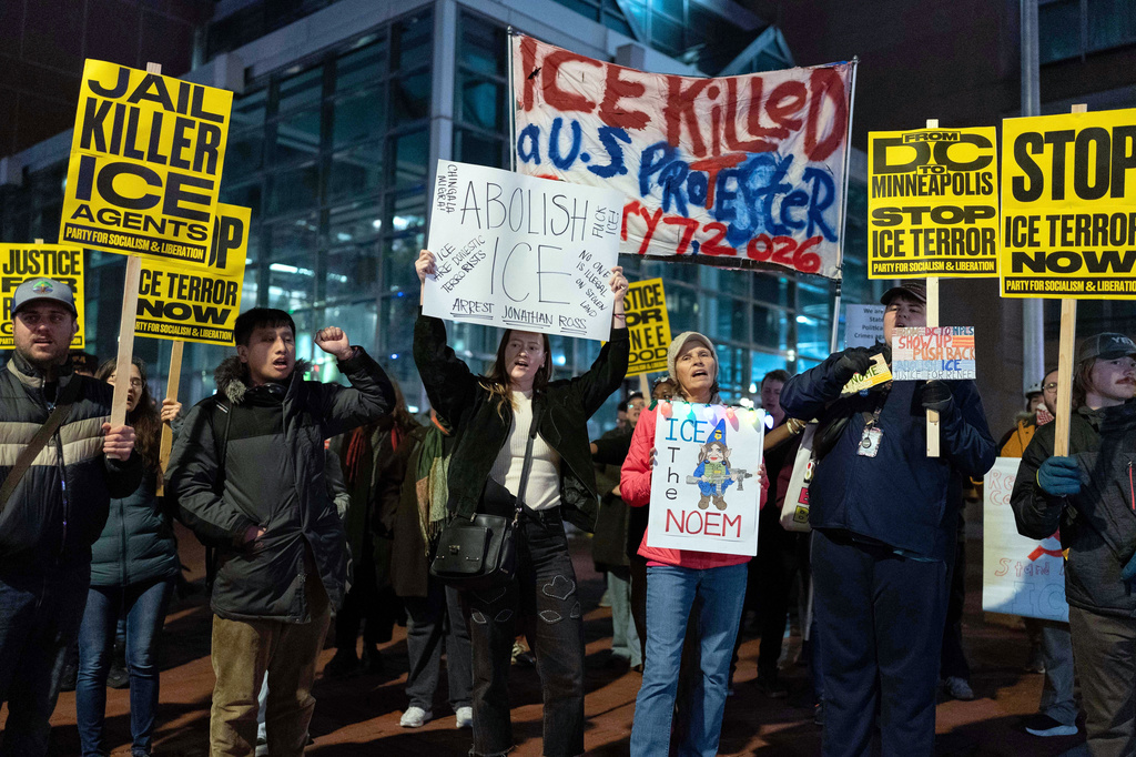 FILE - Demonstrators rally before marching to the White House in Washington, Jan. 8, 2026, as they protest against the Immigration and Customs Enforcement (ICE) agent who fatally shot Renee Nicole Good in Minneapolis. (AP Photo/Jose Luis Magana, File)