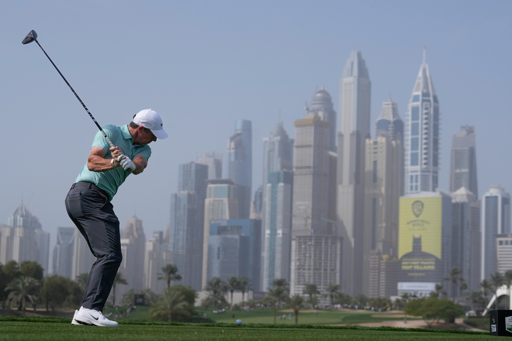 Rory McIlroy of Northern Ireland tees off at 8th hole during the final round of the Dubai Desert Classic in United Arab Emirates, Sunday, Jan. 25, 2026. (AP Photo/Altaf Qadri)