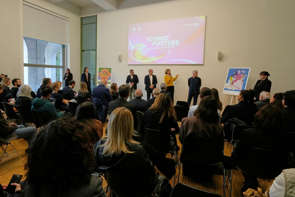 A press conference during the Milano-Cortina 2026 Winter Olympics iconic posters presentation at Milan's Triennale permanent exhibition in Milan, Italy, Wednesday, Oct. 22, 2025. (AP Photo/Luca Bruno)
