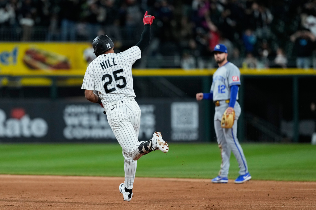 Chicago White Sox's Derek Hill celebrates as he rounds the bases after hitting a solo home run during the eighth inning of a baseball game against the Kansas City Royals in Chicago, Tuesday, May 12, 2026. (AP Photo/Nam Y. Huh)