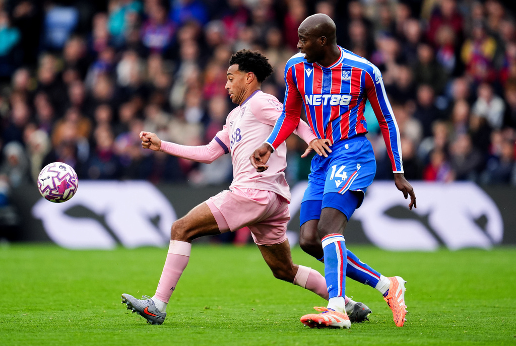 Bournemouth's Tyler Adams and Crystal Palace's Jean-Philippe Mateta, right, in action during the English Premier League soccer match between Crystal Palace and Bournemouth in London, Saturday Oct. 18, 2025. (Adam Davy/PA via AP)