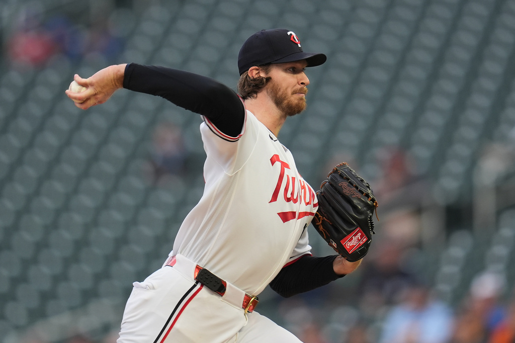 Minnesota Twins starting pitcher Bailey Ober (17) delivers during the first inning of a baseball game against the Boston Red Sox Monday, April 13, 2026, in Minneapolis. (AP Photo/Abbie Parr)