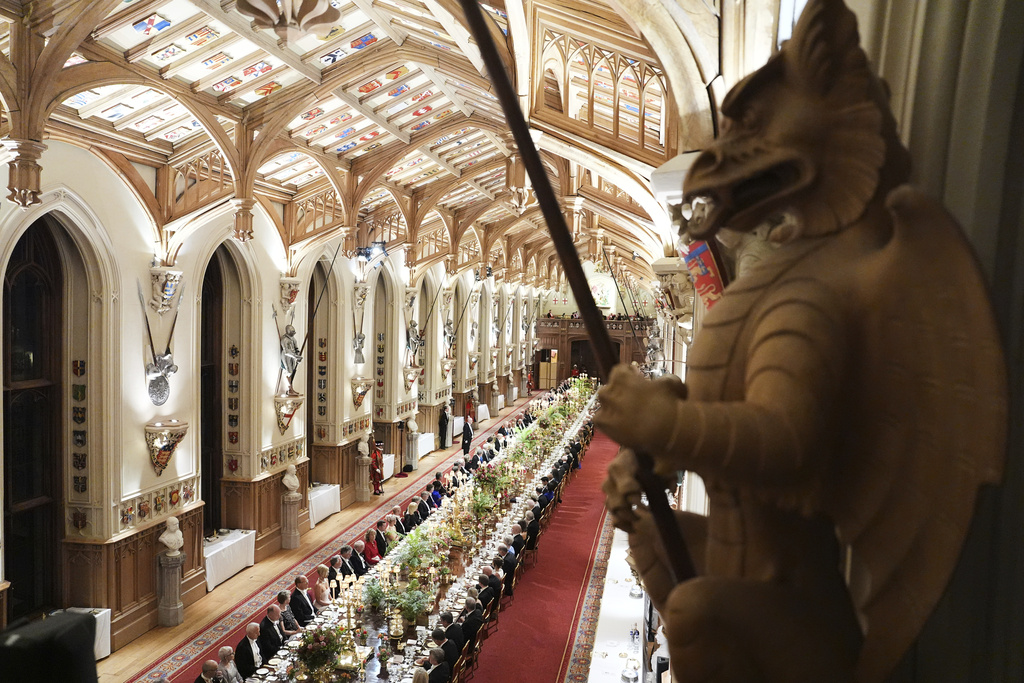 Guests attend a State Banquet during a State visit of President Donald Trump at Windsor Castle in Windsor, England, Wednesday, Sept. 17, 2025. (AP Photo/Evan Vucci, Pool)