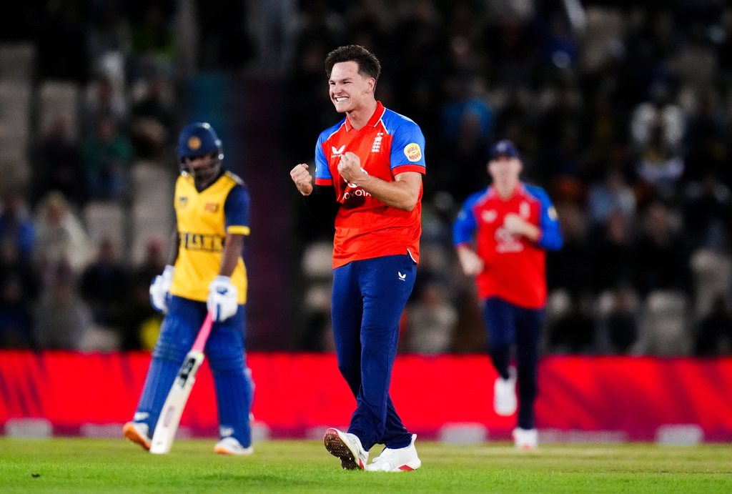 England's Sonny Baker celebrates the wicket of Sri Lanka's Kamil Mishara during the first IT20 match between England and Sri Lanka in Southampton, England, Tuesday Sept. 15, 2026. (John Walton/PA via AP)