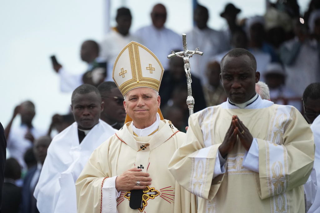 Pope Leo XIV arrives in procession to celebrate Mass at the Japoma Stadium, in Douala, Cameroon, Friday, April 17, 2026, on the fifth day of his 11-day pastoral visit to Africa. (AP Photo/Andrew Medichini)