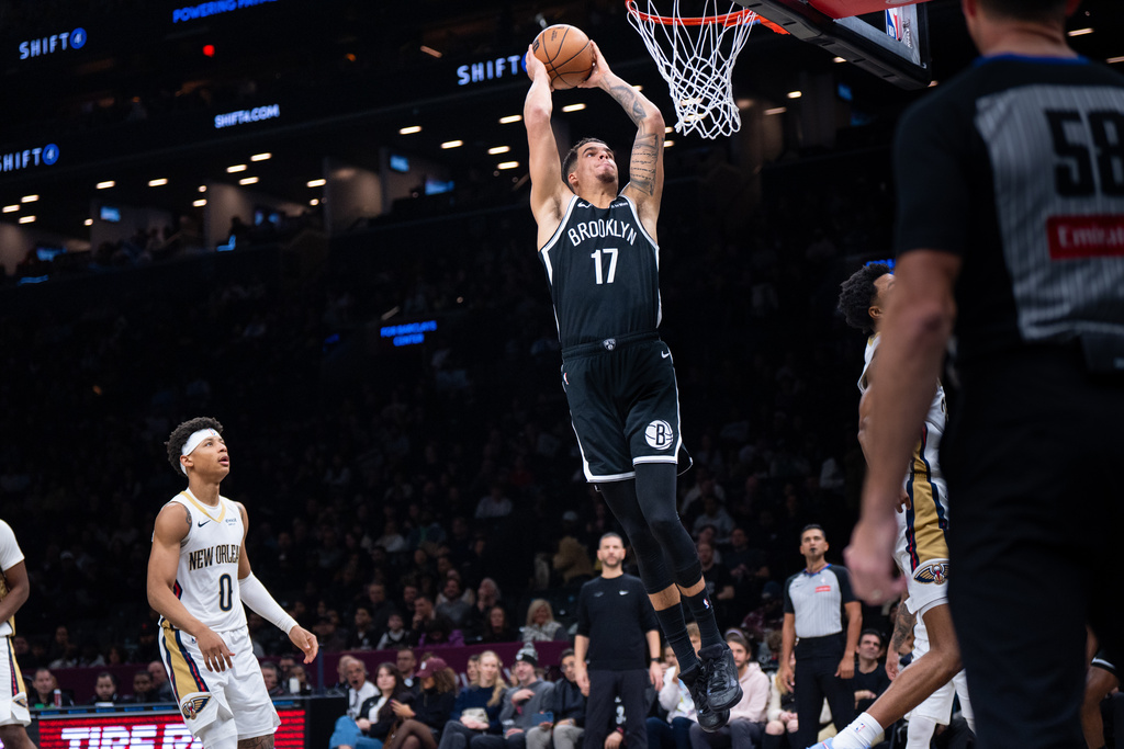 Brooklyn Nets forward Michael Porter Jr. (17) dunks during the first half of an NBA basketball game against the Brooklyn Nets, Saturday, Dec. 6, 2025, in New York. (AP Photo/Angelina Katsanis)