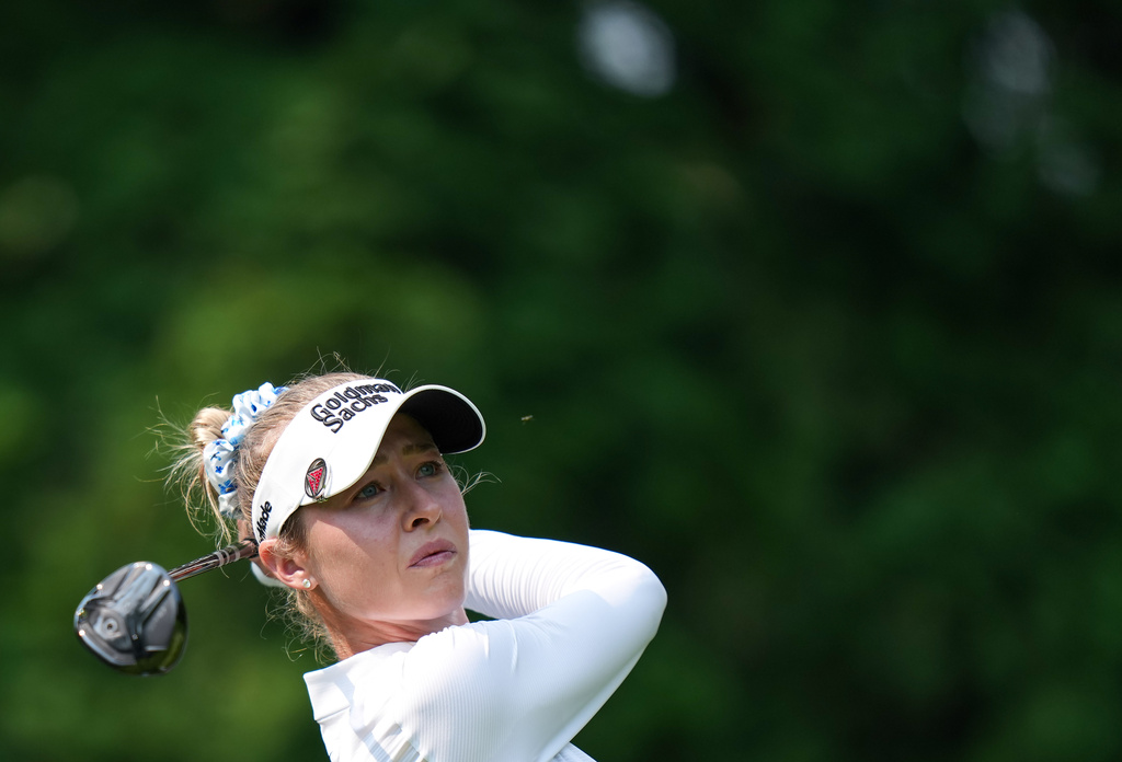 Nelly Korda, of the United States, watches her tee shot on the fourth hole during the final round at the LPGA Canadian Women's Open golf tournament in Edmonton, Alberta, Sunday, Aug. 23, 2026. (Darryl Dyck/The Canadian Press via AP)