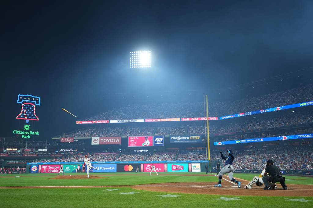 Tampa Bay Rays' Yandy Diaz loses control of the bat in the fifth inning during the MLB baseball All-Star Game between the American League and National League, Tuesday, July 14, 2026, in Philadelphia. (AP Photo/Matt Rourke)