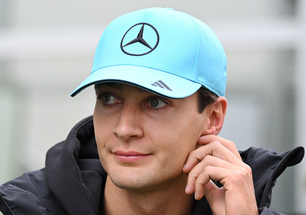 Mercedes driver George Russell, of Britain, walks through the paddock at the F1 Canadian Grand Prix auto race in Montreal, Sunday, May 24, 2026. (Graham Hughes/The Canadian Press via AP)