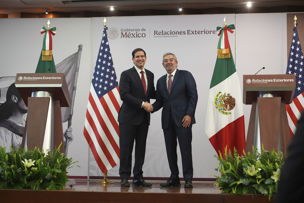 Secretary of State Marco Rubio, left, and Mexico's Foreign Secretary Juan Ramon de la Fuente shake hands following a news conference at the Foreign Ministry in Mexico City, Wednesday, Sept. 3, 2025. (AP Photo/Jacquelyn Martin, pool)