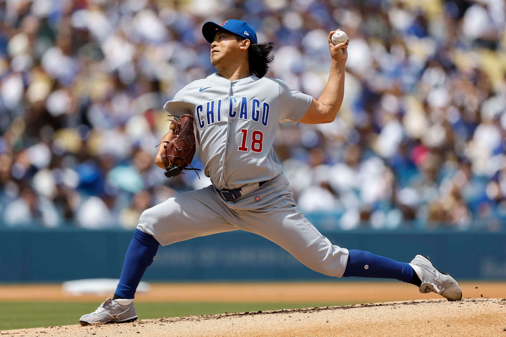 Chicago Cubs starting pitcher Shota Imanaga (18) works during the first inning of a baseball game against the Los Angeles Dodgers, Sunday, April 26, 2026, in Los Angeles. (AP Photo/Caroline Brehman)