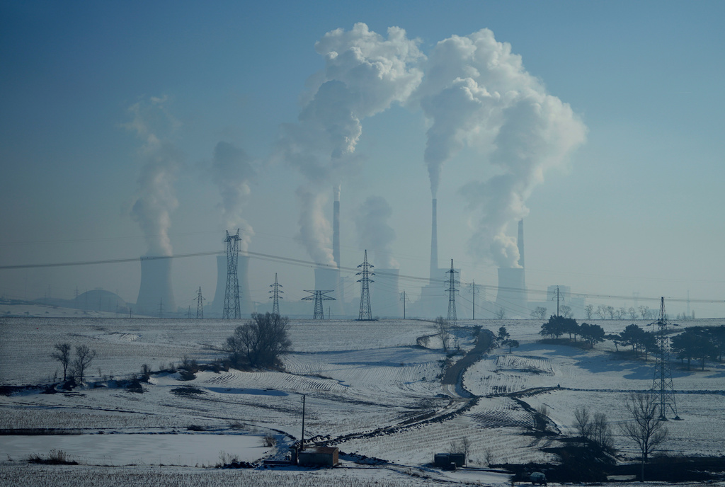CORRECTS THE LOCATION OF THE PROVINCE TO NORTHEASTERN, NOT NORTHWESTERN - A power plant is seen near Shenyang in northeastern China's Liaoning province on Jan. 3, 2026. (AP Photo/Ng Han Guan)
