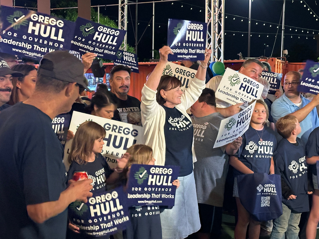 Supporters of Republican gubernatorial nominee Gregg Hull cheer during an Election Night watch party in Albuquerque, New Mexico, on Tuesday, June 2, 2026. (AP Photo/Susan Montoya Bryan)