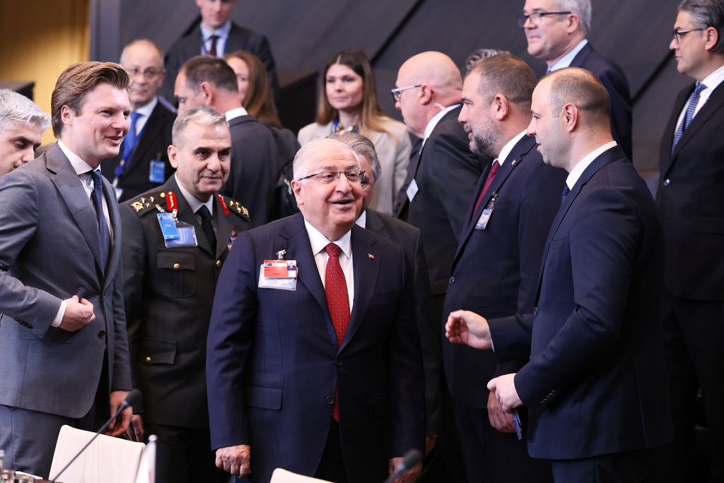 Turkish Defense Minister Yasar Guler, center, and Netherland's Defense Minister Ruben Brekelmans, second left, arrive for a meeting of the North Atlantic Council in defense ministers format at NATO headquarters in Brussels, Wednesday, Oct. 15, 2025 (AP Photo/Omar Havana)