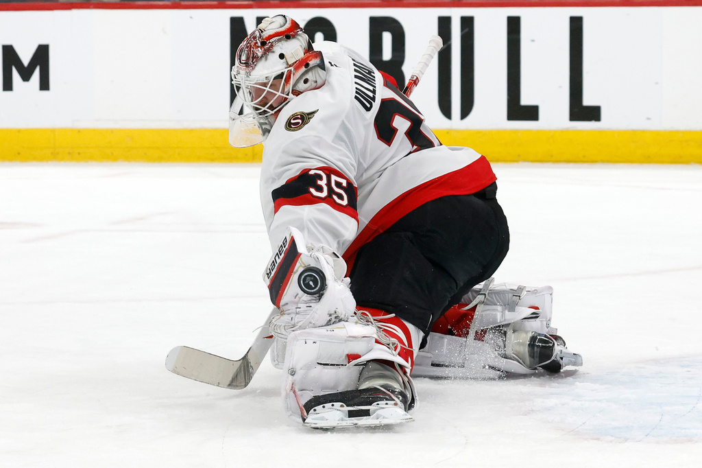FILE - Ottawa Senators goaltender Linus Ullmark (35) blocks the penalty shot of Carolina Hurricanes' Jordan Martinook, not shown, during the first overtime of Game 2 of an NHL hockey Stanley Cup first-round playoff series in Raleigh, N.C., Monday, April 20, 2026. (AP Photo/Karl DeBlaker, File)