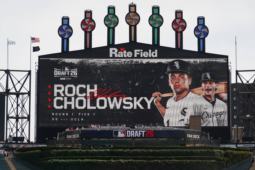 UCLA shortstop Roch Cholowsky goes No. 1 overall to the Chicago White Sox during the 2026 MLB Draft shown on the scoreboard before a baseball game between the Chicago White Sox and the Athletics Saturday, July 11, 2026, in Chicago. (AP Photo/David Banks)