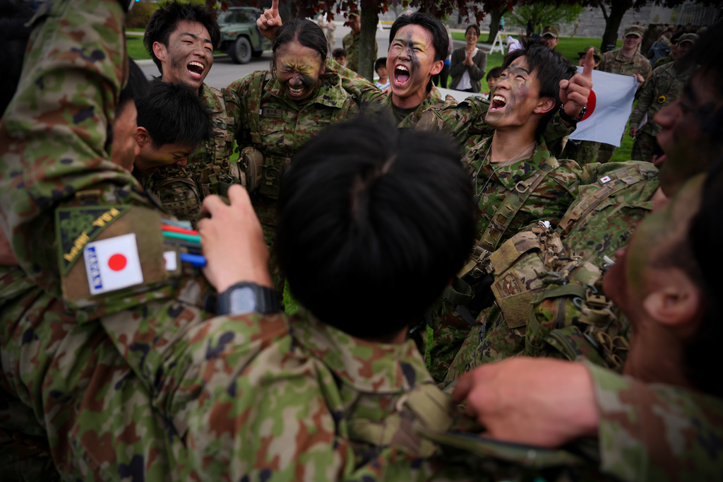Japanese cadets celebrate after completing the crucible portion of the Sandhurst Military Skills Competition at the United States Military Academy in West Point, N.Y., Saturday, May 2, 2026. (AP Photo/Julia Demaree Nikhinson)