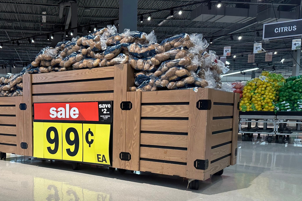 Potatoes are on display at a Meijer store Friday, Nov. 21, 2025, in Canton Township, Mich. (AP Photo/Mike Householder)