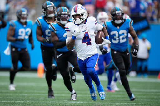 Buffalo Bills running back James Cook III (4) runs for a touchdown against the Carolina Panthers during the first half an NFL football game, Sunday, Oct. 26, 2025, in Charlotte, N.C. (AP Photo/Jacob Kupferman) Buffalo Bills running back James Cook III (4) runs for a touchdown against the Carolina Panthers during the first half an NFL football game, Sunday, Oct. 26, 2025, in Charlotte, N.C. (AP Photo/Jacob Kupferman)